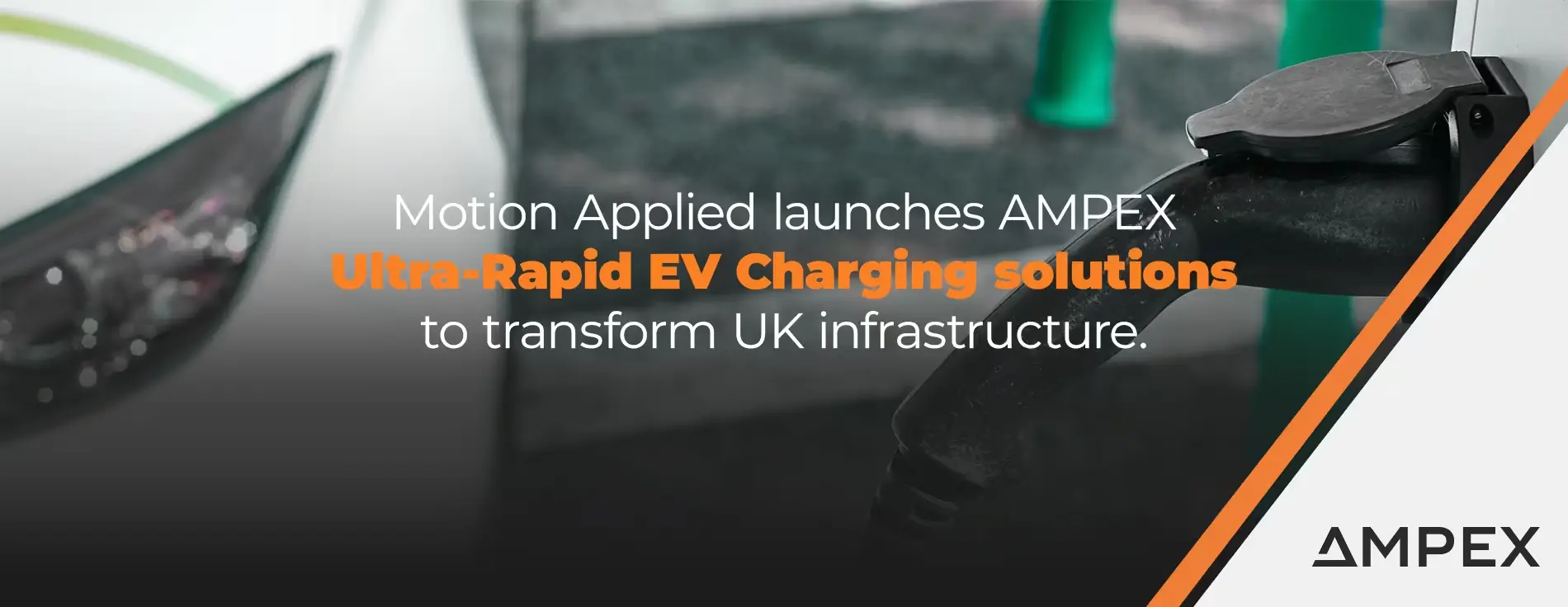 Close-up of an electric vehicle charging connector plugged into a station, with text overlay reading ‘Motion Applied launches AMPEX Ultra-Rapid EV Charging solutions to transform UK infrastructure.’ AMPEX logo appears in the bottom right corner.